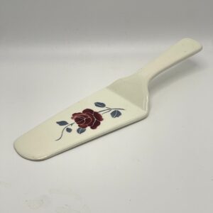 Pelle à tarte en faience décor rose bordeaux et grise